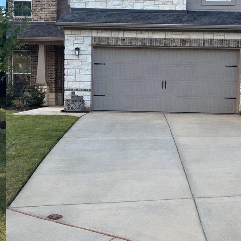 Concrete driveway and garage apron before and after pressure washing by Ascension Exteriors