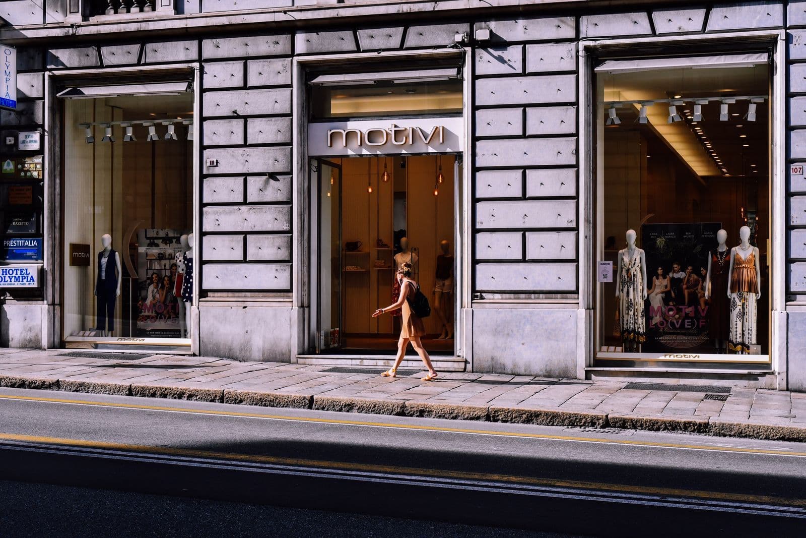 A retail storefront and its entry sidewalk, the surfaces commercial cleaning keeps presentable